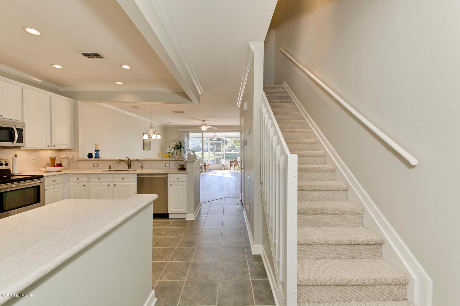 7990 Baymeadows Road, Unit 1406 Jacksonville, FL 32256 - Photo 3 of 48 Foyer to Living Area
