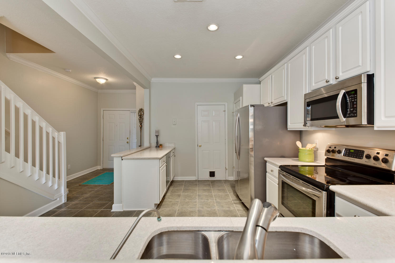 7990 Baymeadows Road, Unit 1406 Jacksonville, FL 32256 - Photo 8 of 48 Kitchen to Foyer