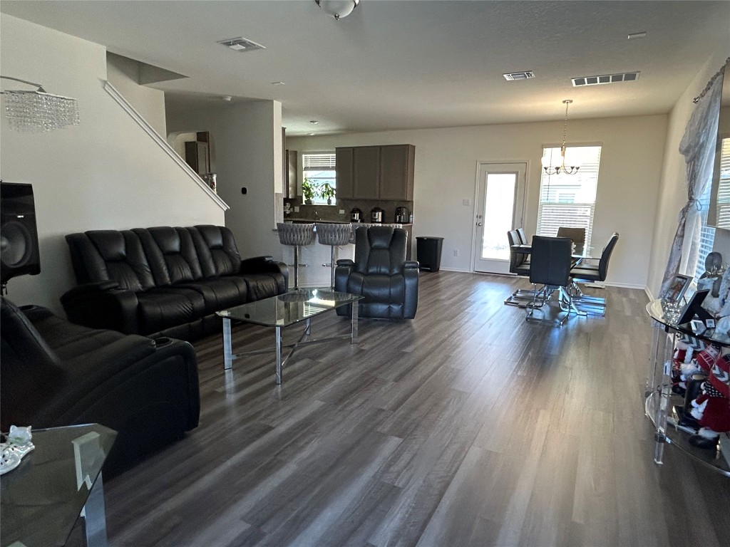 420 Lt. Rusty Jarrell, TX 76537 - Photo 5 of 17 Living area with dark wood-style floors and baseboards