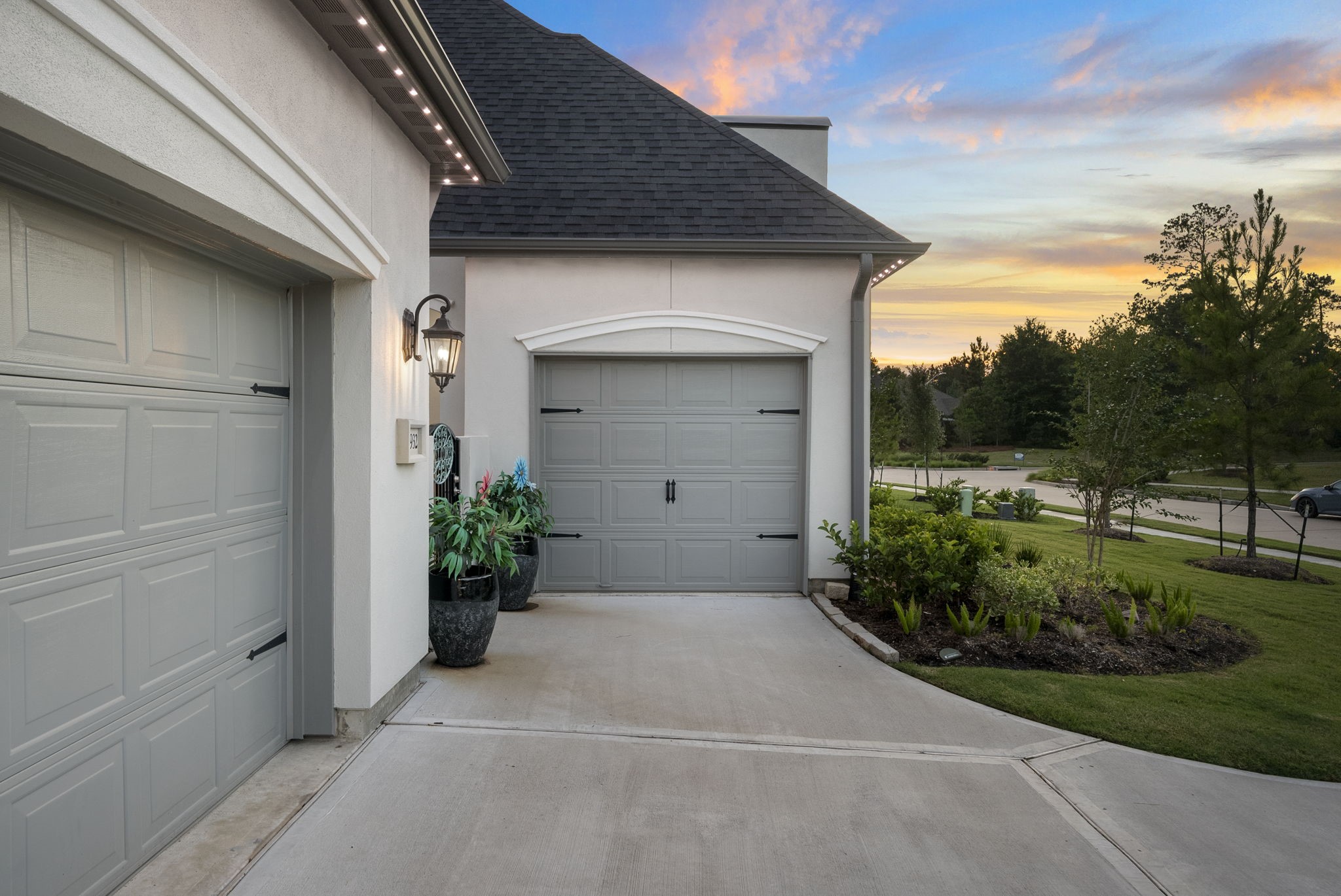 12932 Whitewater Way Conroe, TX 77302 - Photo 35 of 48 Spacious three-car garage with ample room for vehicles, storage, and hobbies.