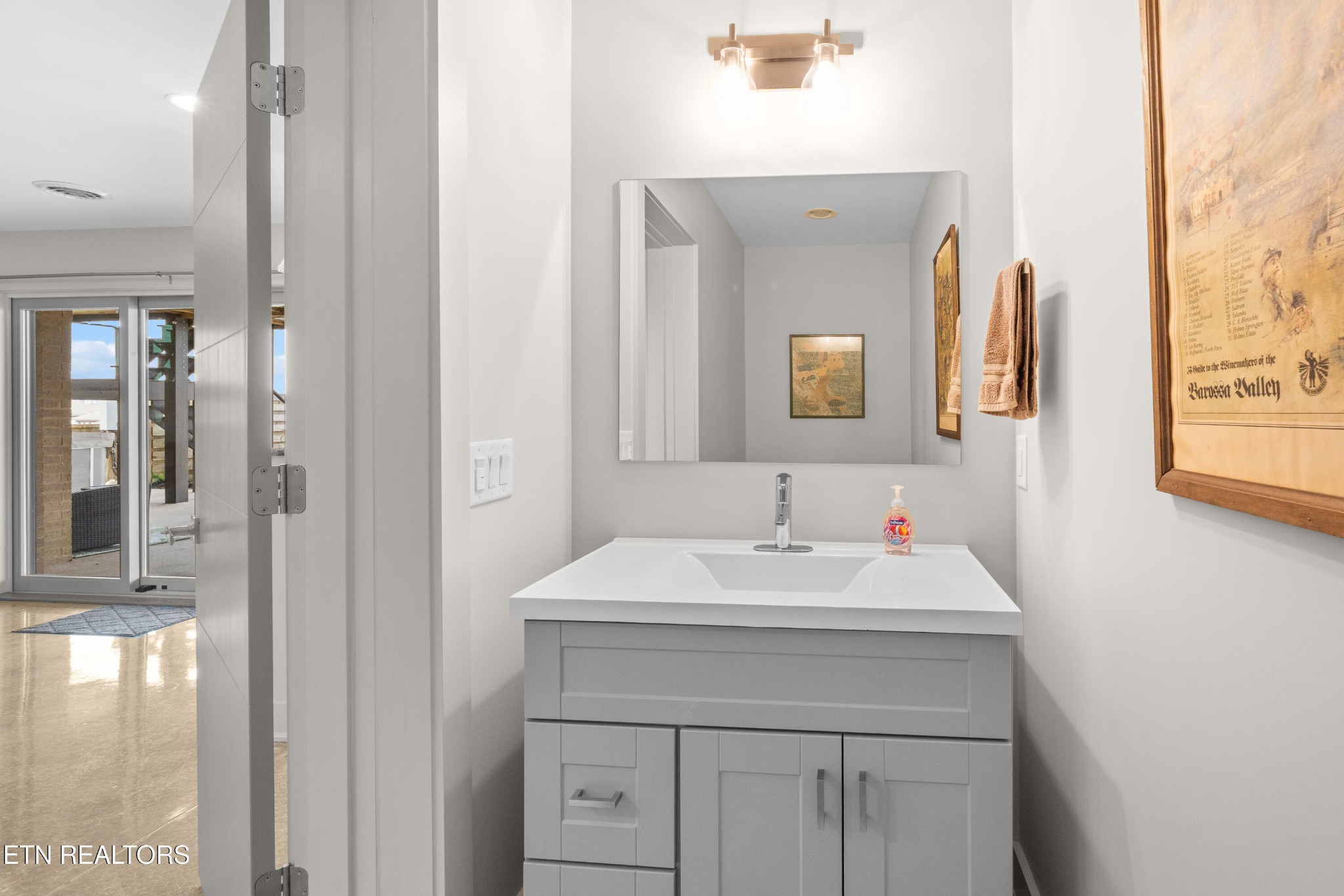 3702 Promontory Point Louisville, TN 37777 - Photo 40 of 60 a bathroom with a sink and a mirror