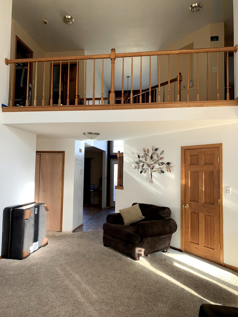 3815 River Road Hazel Crest, IL 60429 - Photo 14 of 25 a living room with furniture a ceiling fan