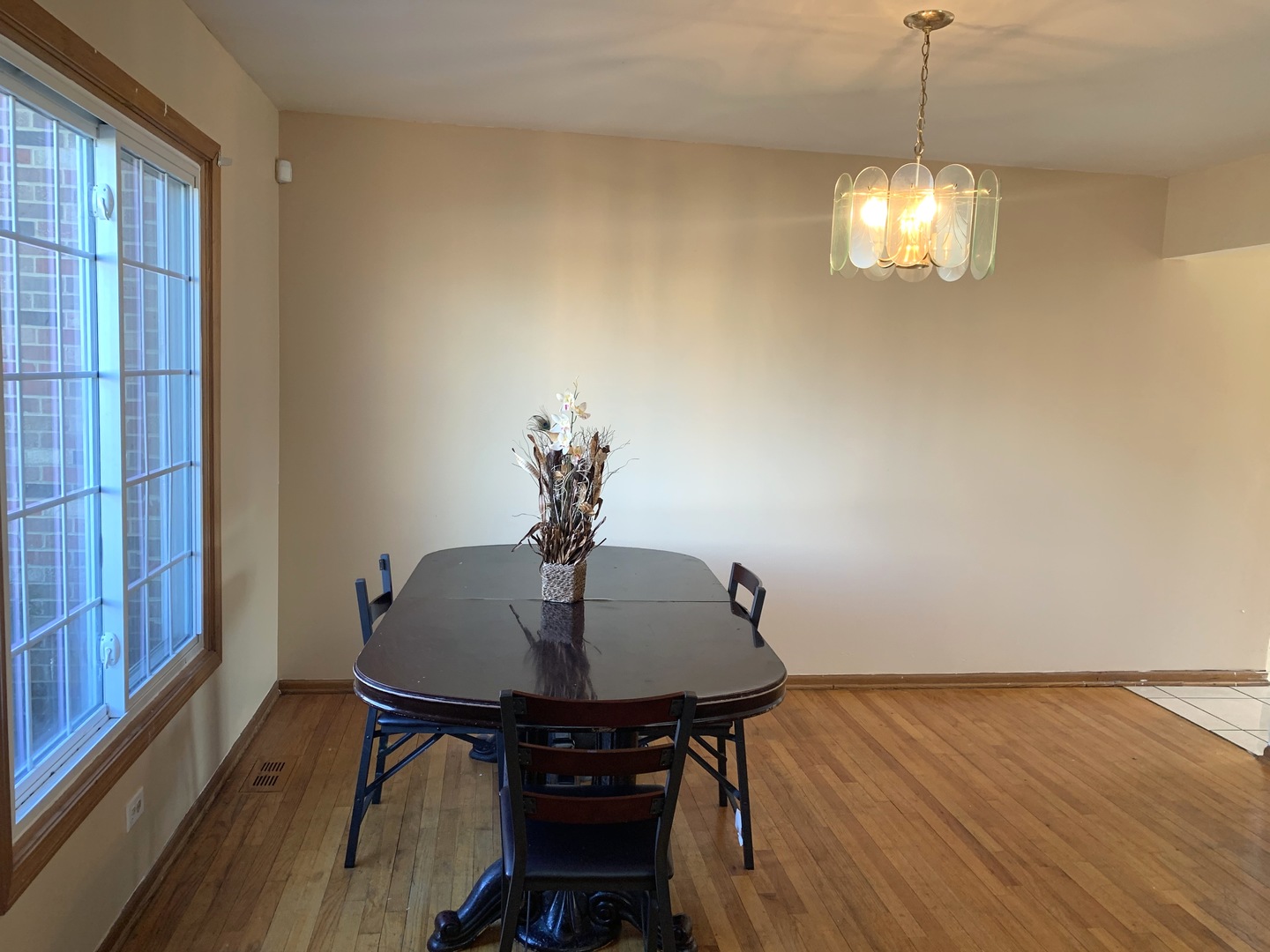 3815 River Road Hazel Crest, IL 60429 - Photo 6 of 25 a view of a dining room with furniture and wooden floor