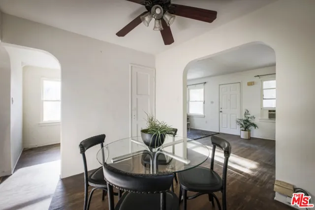 a view of bathroom with a sink toilet and a mirror