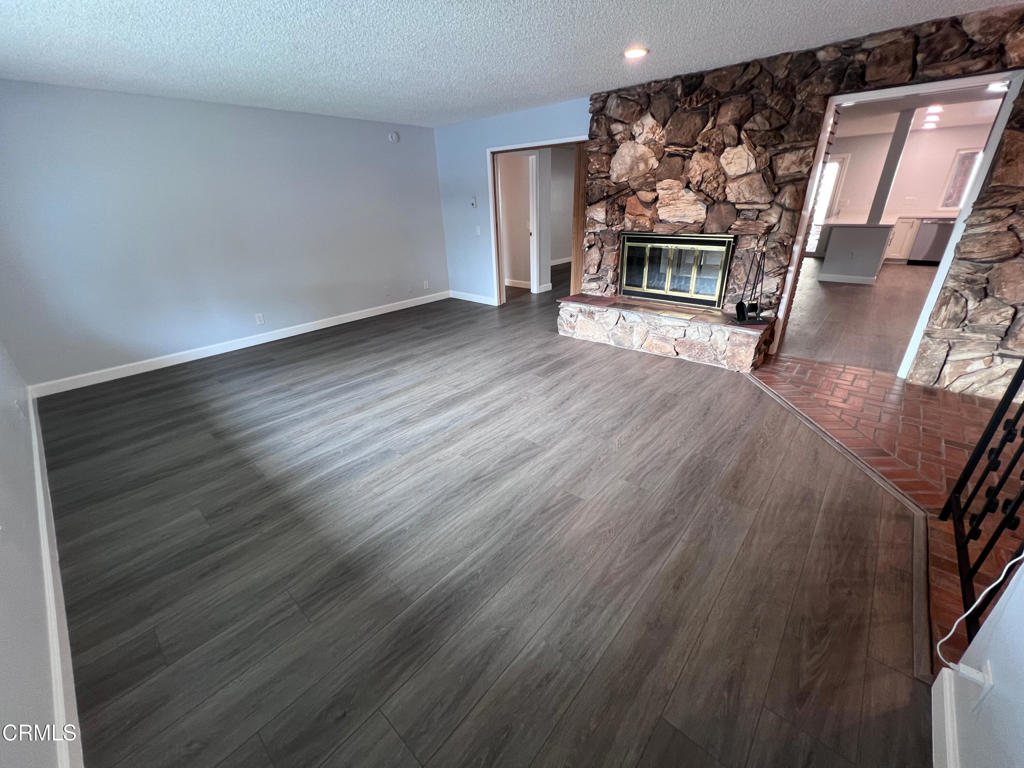 10945 Kings Road Ventura, CA 93004 - Photo 5 of 19 a view of a livingroom with a fireplace
