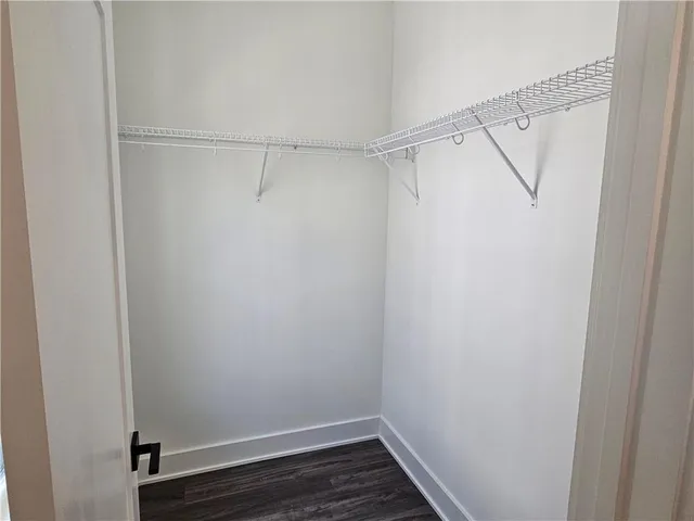a view of an empty walk in closet