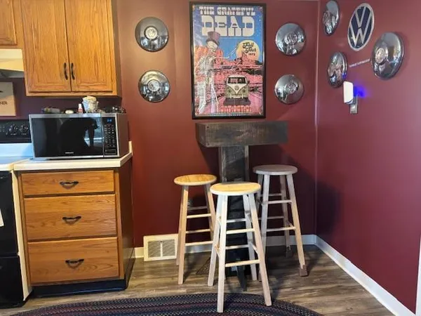 a view of wooden cabinets and window