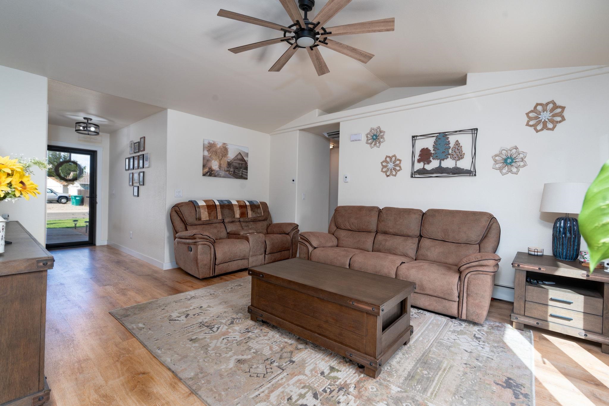 1300 Powell Street Fruita, CO 81521 - Photo 18 of 25 a living room with furniture and a couch