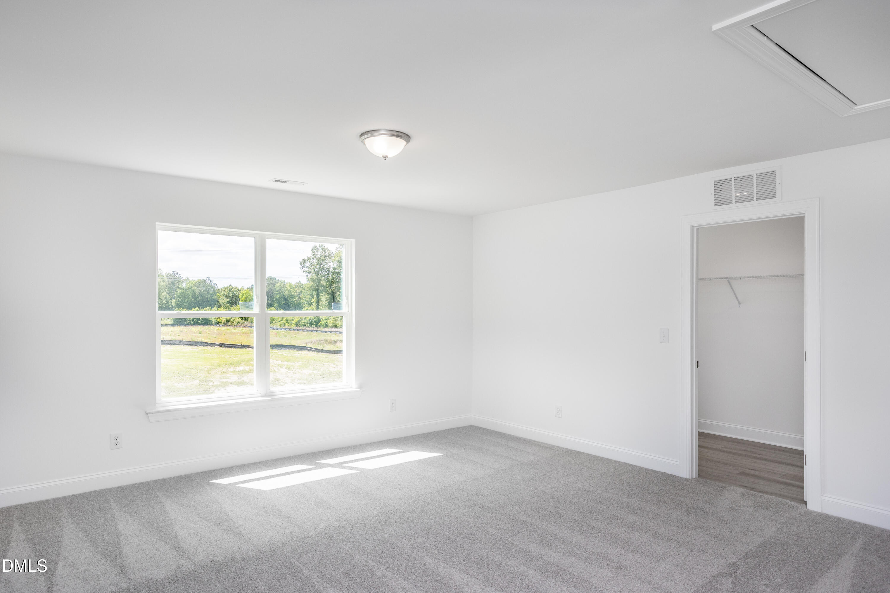 216 Cedar Rdg Trail Angier, NC 27501 - Photo 22 of 33 an empty room with windows