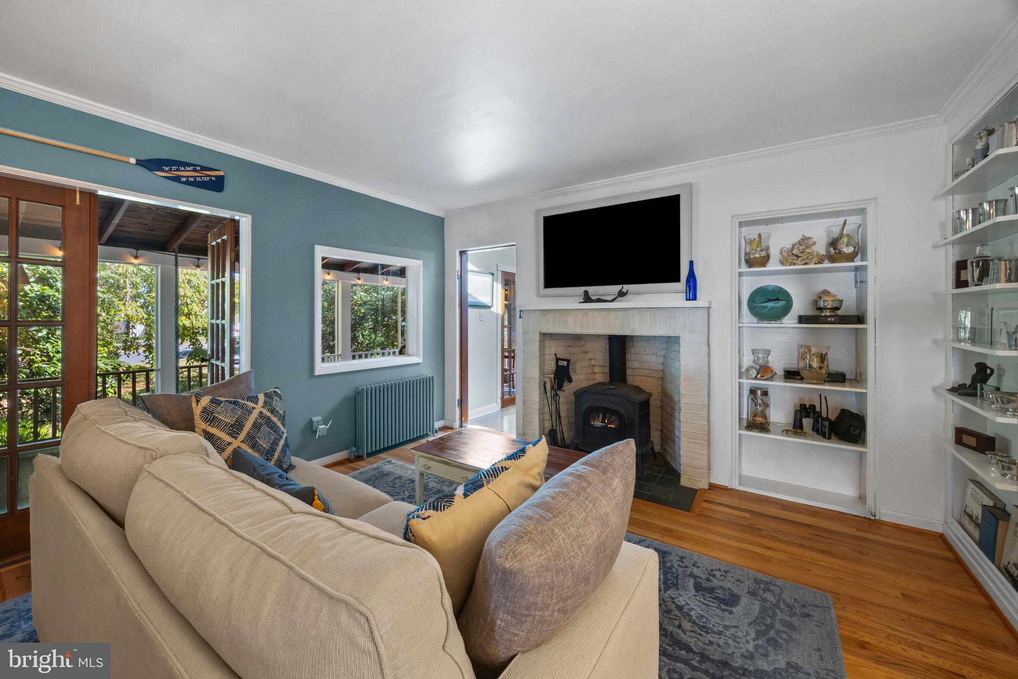 30 Decatur Avenue Annapolis, MD 21403 - Photo 9 of 38 a living room with furniture a flat screen tv and a fireplace