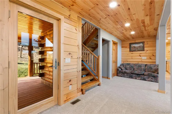 a view of an entryway with seating area