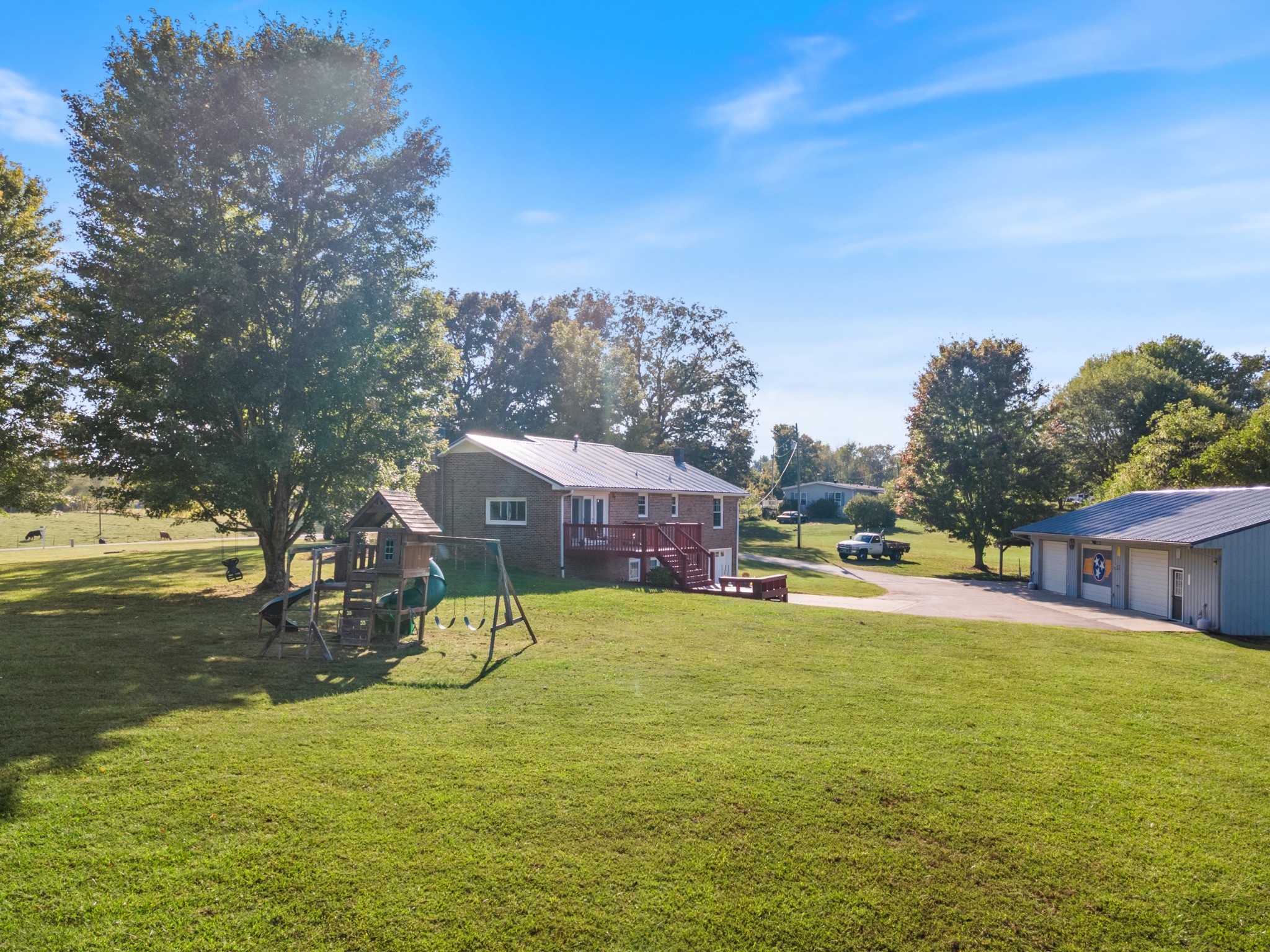 a view of a lake with a house in the background