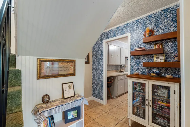a view of a kitchen cabinets and a stove top oven