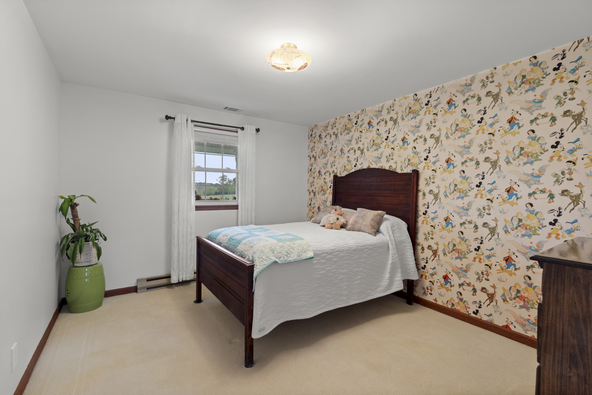 10779 North Tidwell Road Bon Aqua, TN 37025 - Photo 29 of 46 a bedroom with a bed and a window