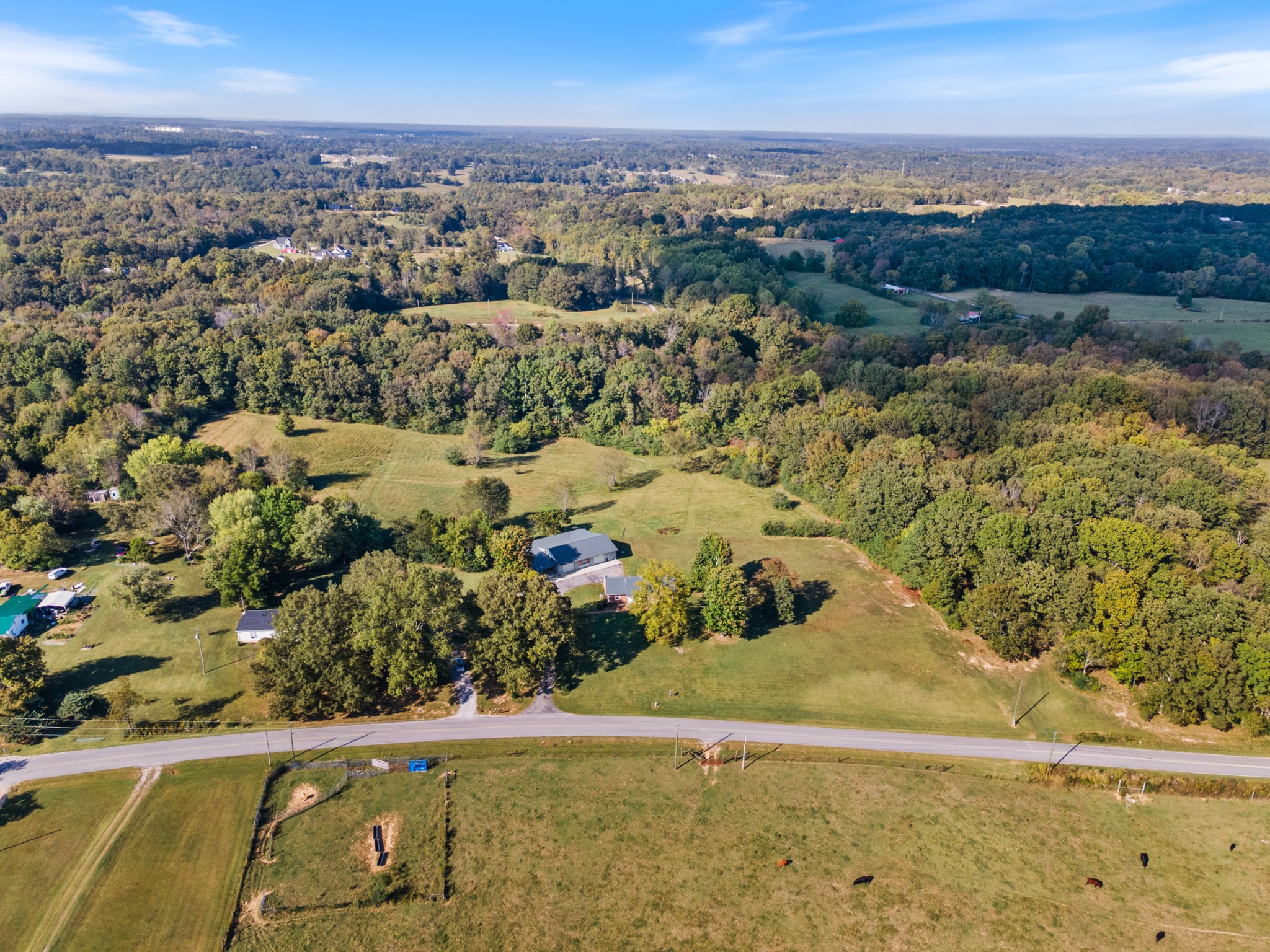 10779 North Tidwell Road Bon Aqua, TN 37025 - Photo 43 of 44 a view of a lake with a yard