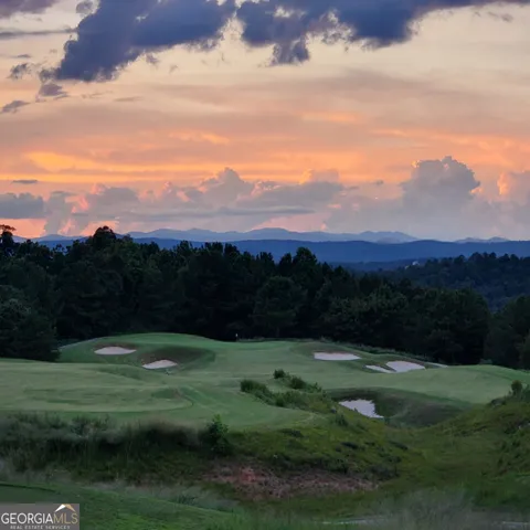 a view of an ocean and mountain