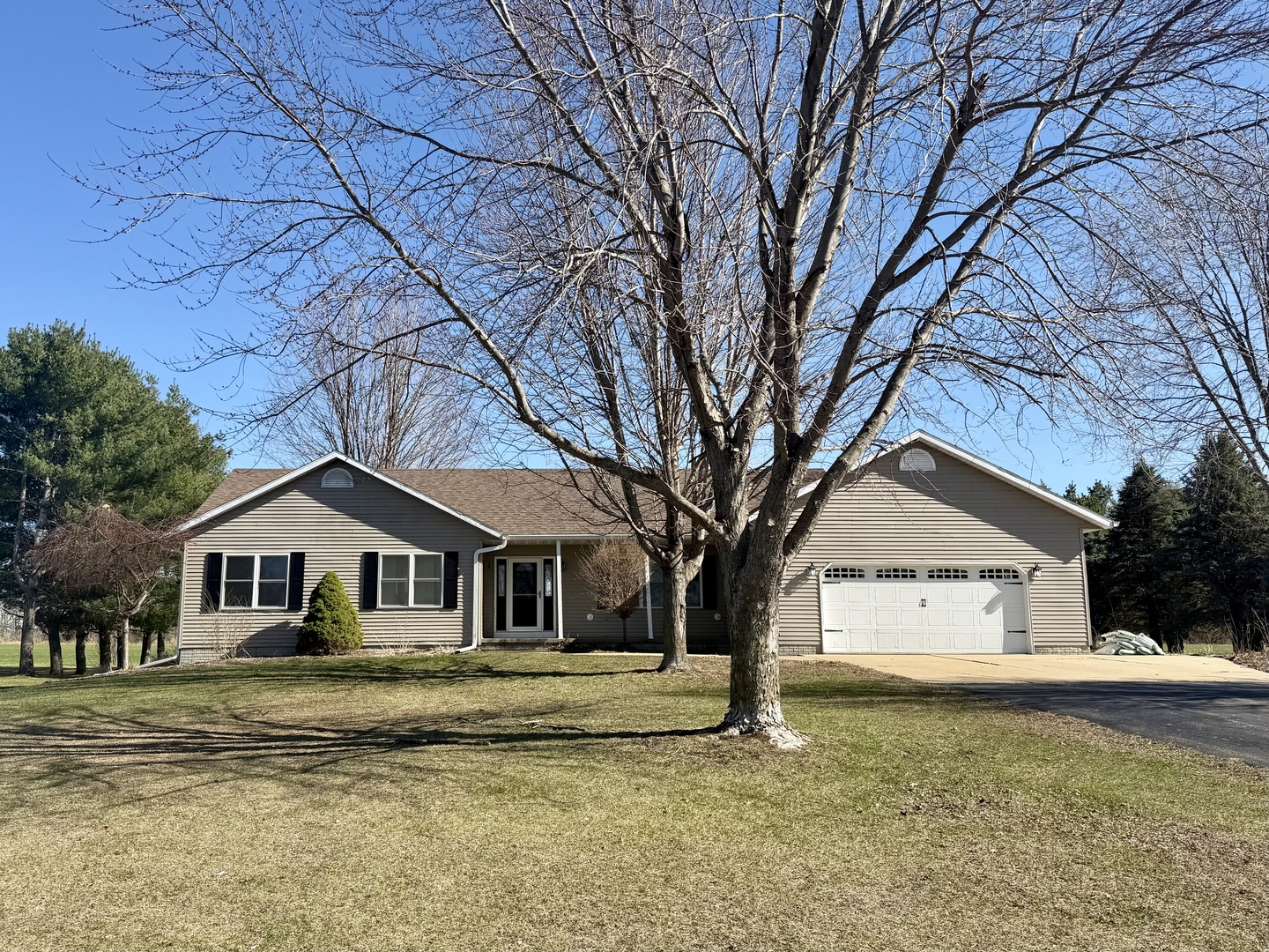 20922 Cattail Road Fulton, IL 61252 - Photo 1 of 30 a house with trees in the background