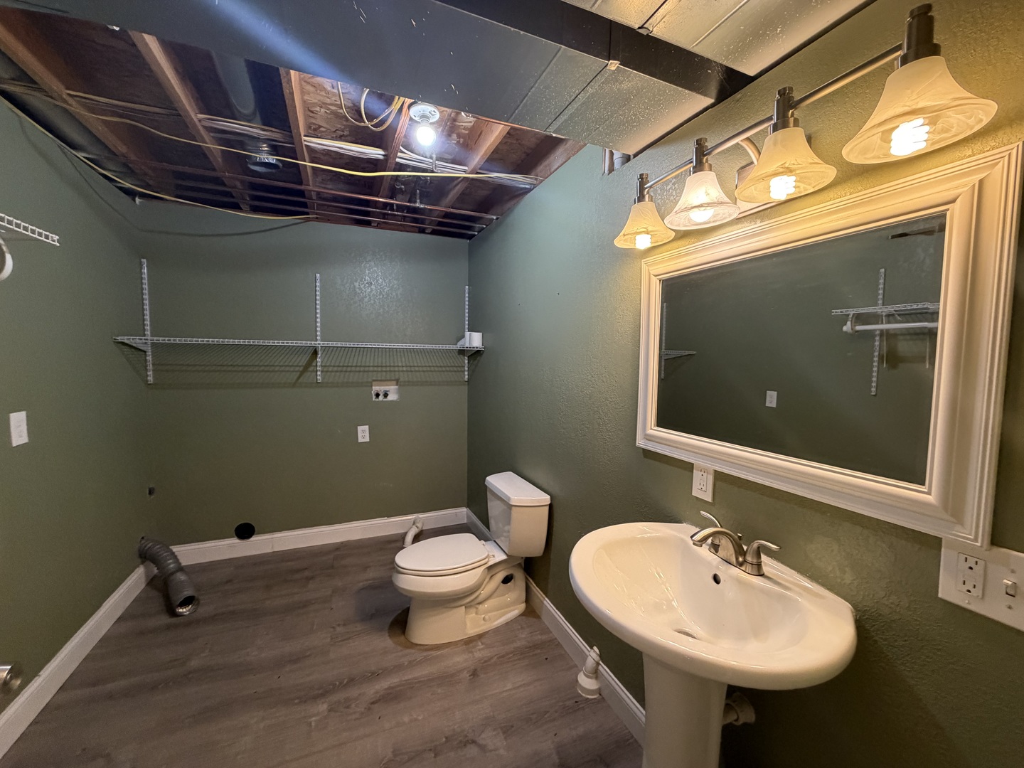 20922 Cattail Road Fulton, IL 61252 - Photo 27 of 30 a bathroom with a sink and mirror
