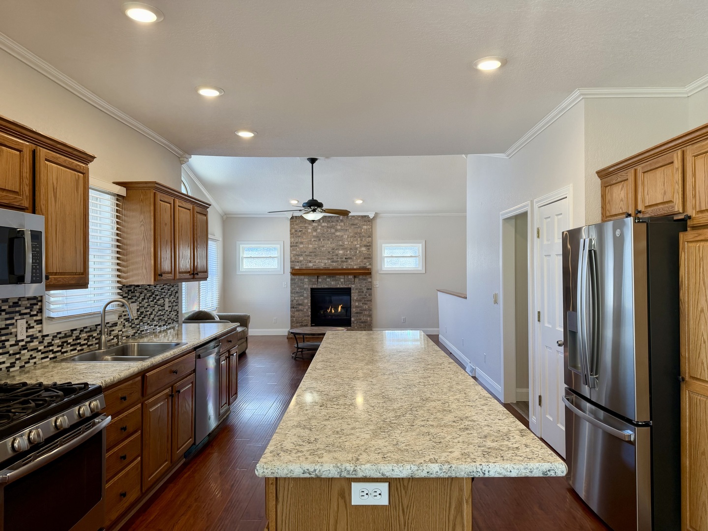 20922 Cattail Road Fulton, IL 61252 - Photo 3 of 30 a kitchen with sink stove and refrigerator