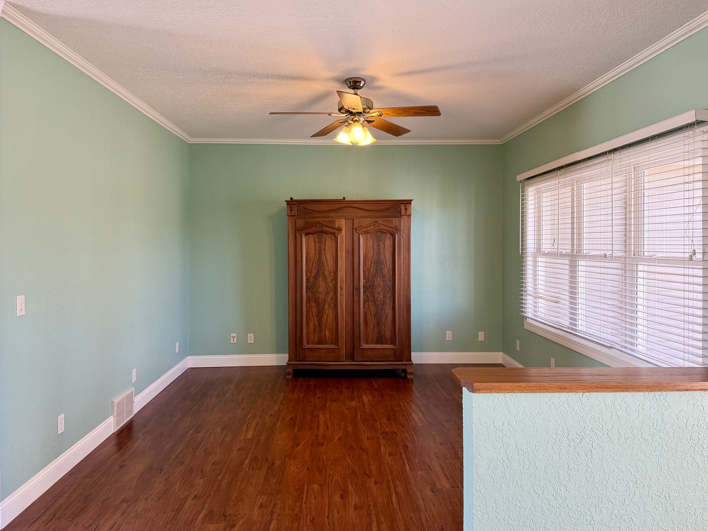 20922 Cattail Road Fulton, IL 61252 - Photo 9 of 30 an empty room with wooden floor and windows