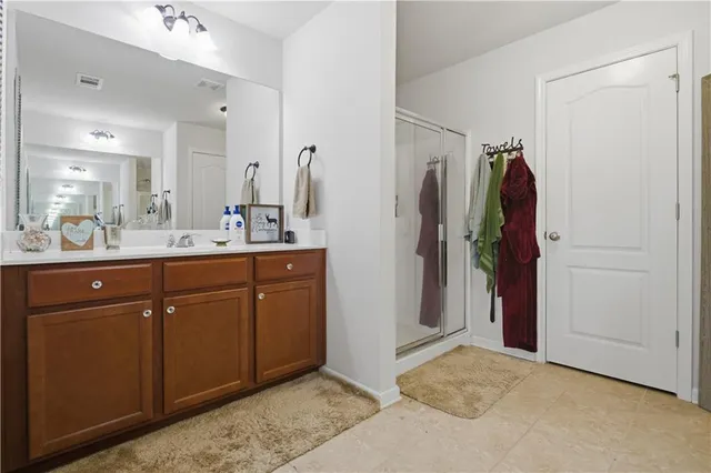 a livingroom with window and a flat screen tv