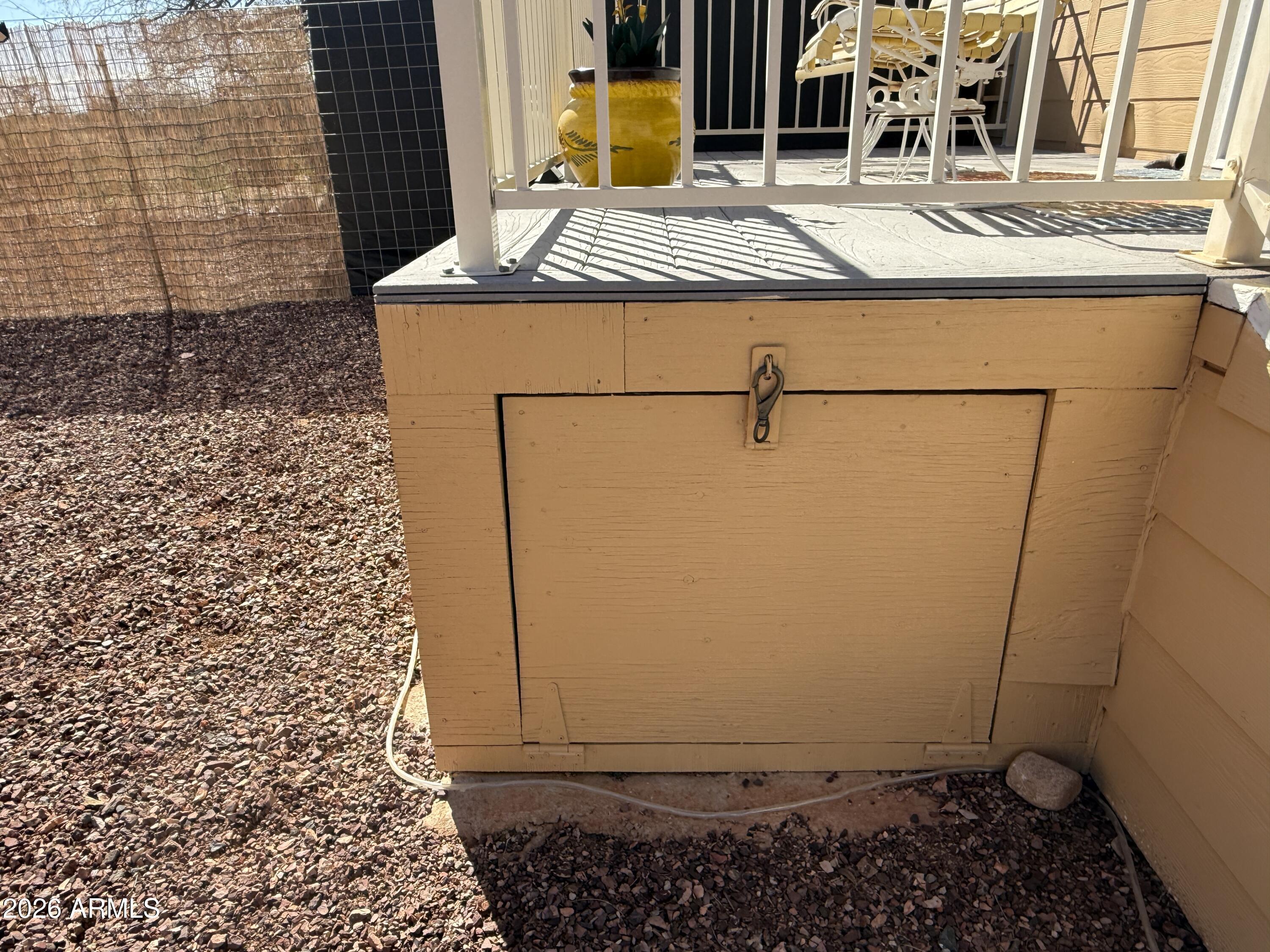 21175 Westward View Road, Unit 241 Congress, AZ 85332 - Photo 46 of 49 Storage under Porch (1)