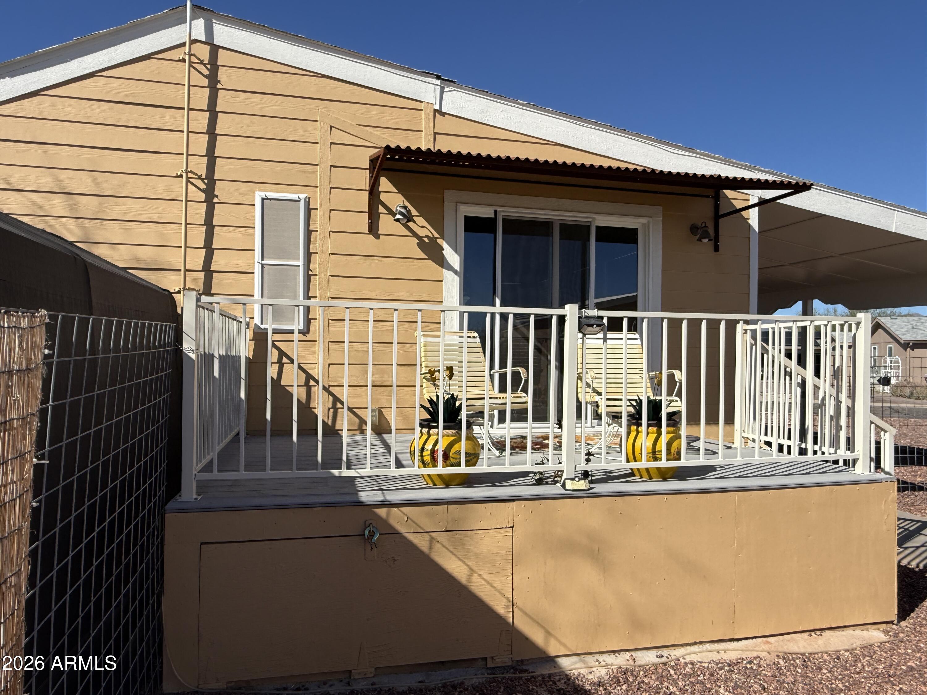 21175 Westward View Road, Unit 241 Congress, AZ 85332 - Photo 47 of 49 Storage under Porch (2)