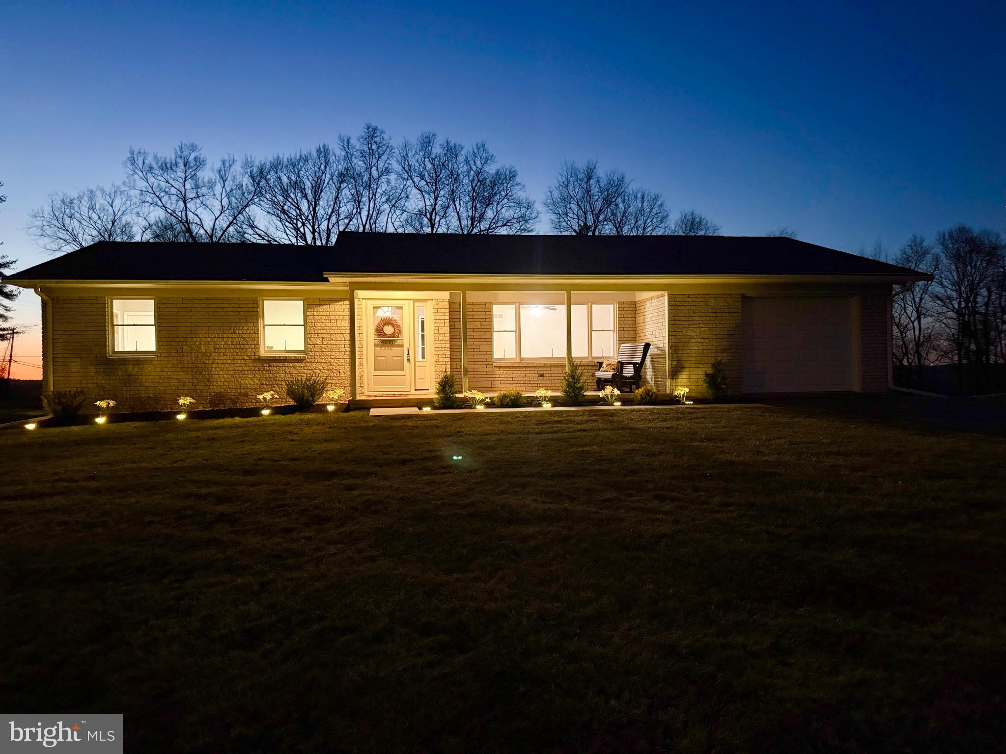 a view of a big yard with an outdoor space