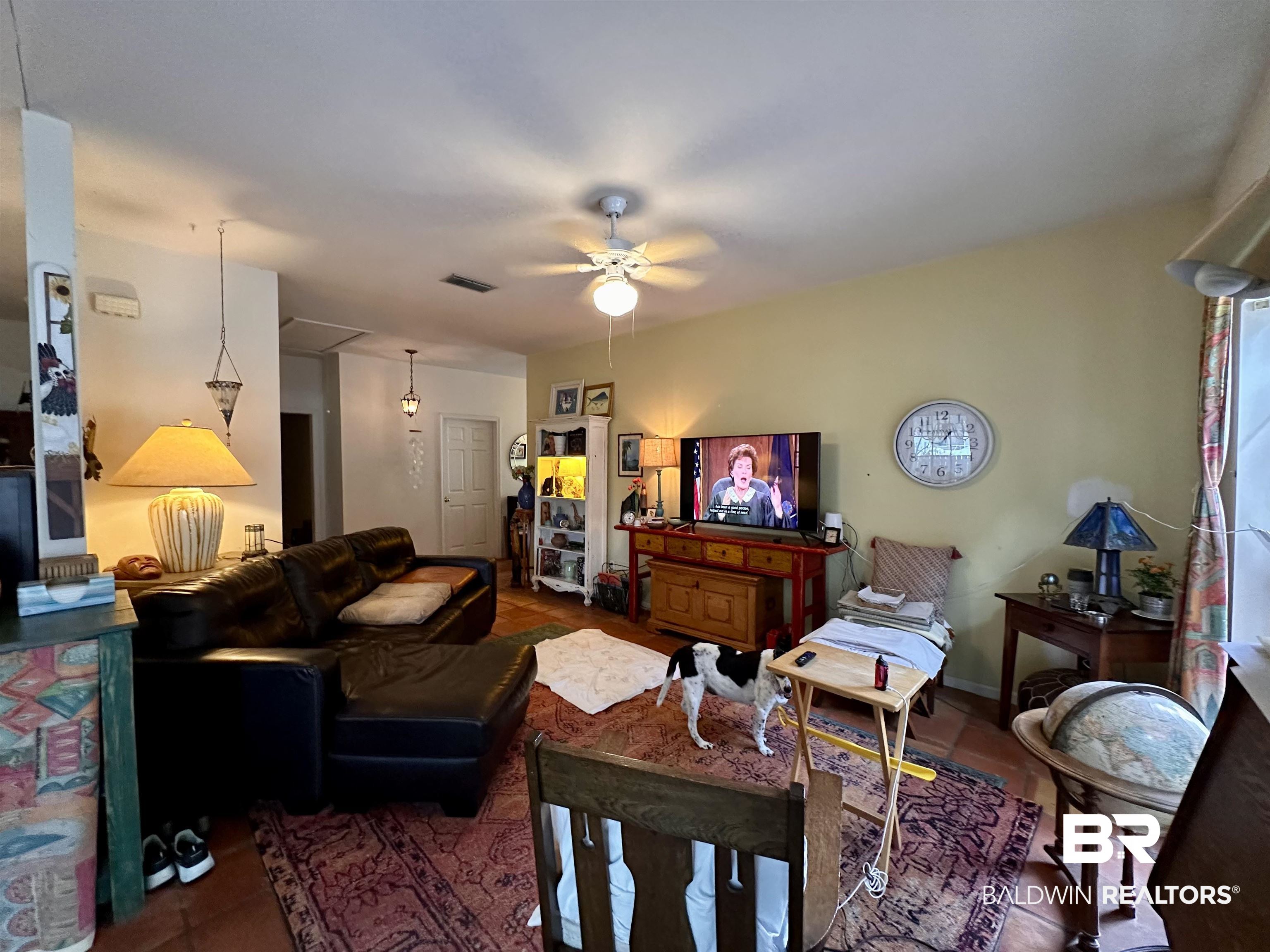 9101 Coronada Road Elberta, AL 36530 - Photo 8 of 27 Tiled living room featuring a ceiling fan