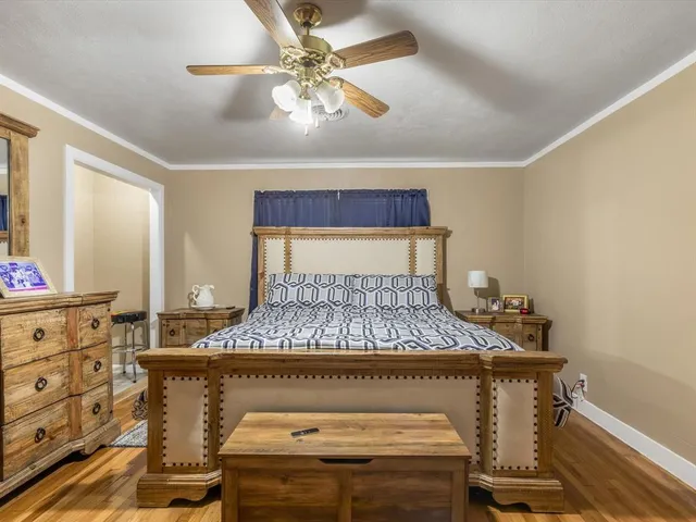 a room with a bed and furniture