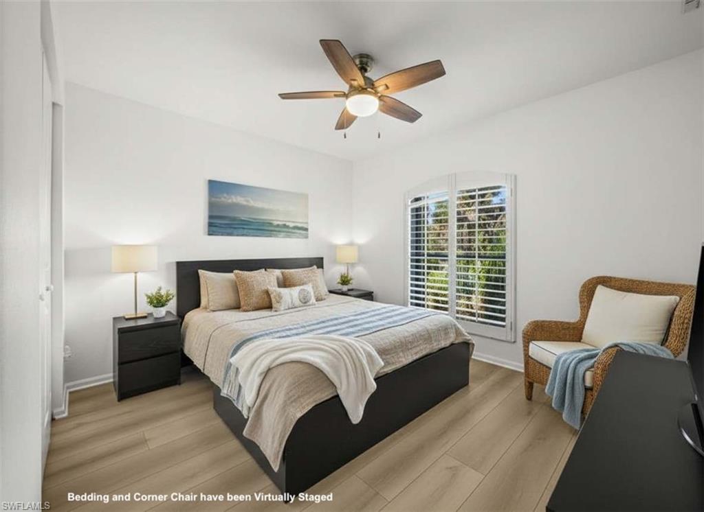 4 Colonial Drive Naples, FL 34112 - Photo 24 of 42 Bedroom featuring light wood finished floors and ceiling fan