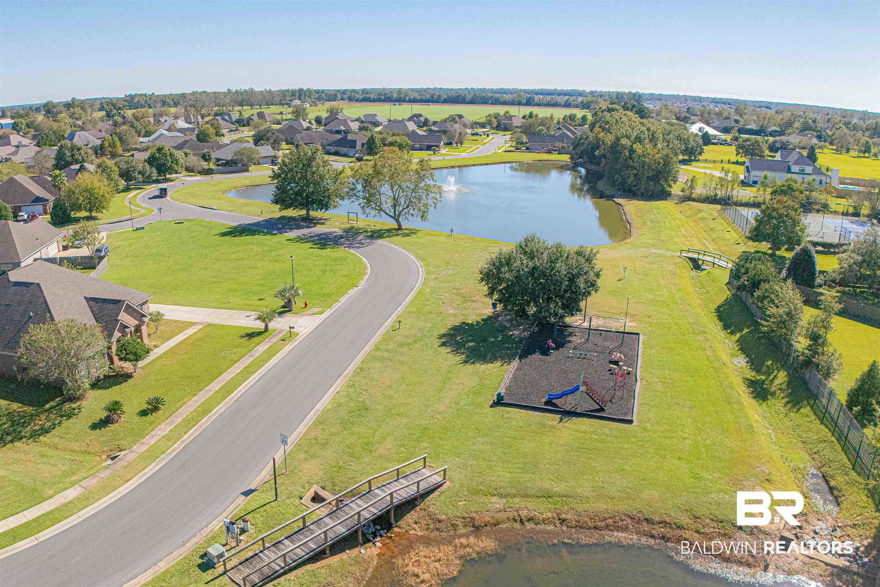 25234 Fairfax Road Daphne, AL 36526 - Photo 38 of 45 Aerial perspective of suburban area featuring a nearby body of water