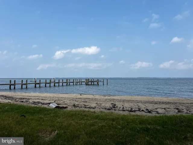 a view of a roof deck with sitting area