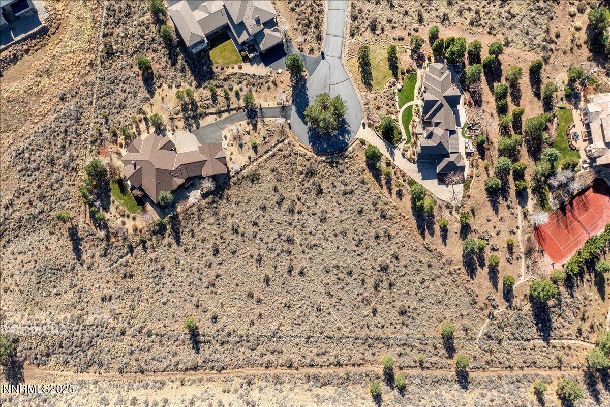 205 Paddington Court Reno, NV 89511 - Photo 16 of 17 a aerial view of a yard with parking space