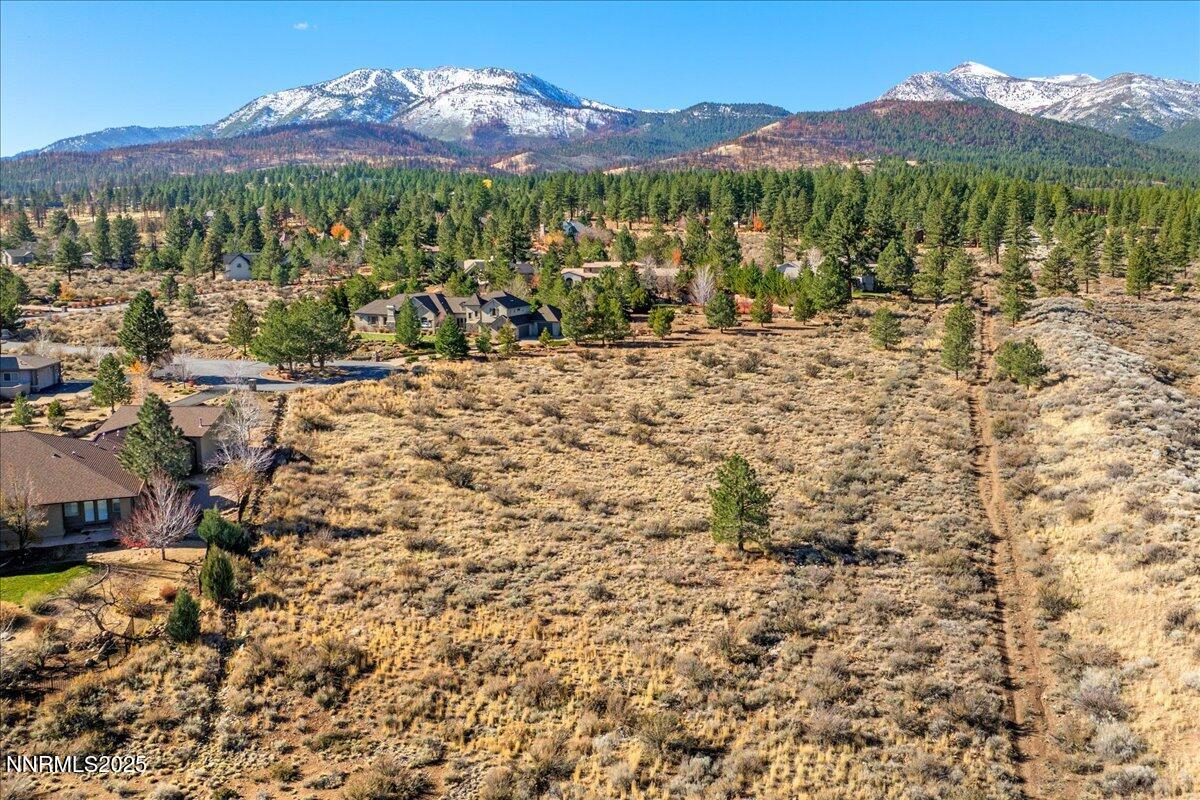 205 Paddington Court Reno, NV 89511 - Photo 2 of 17 a view of a town with mountains in the background