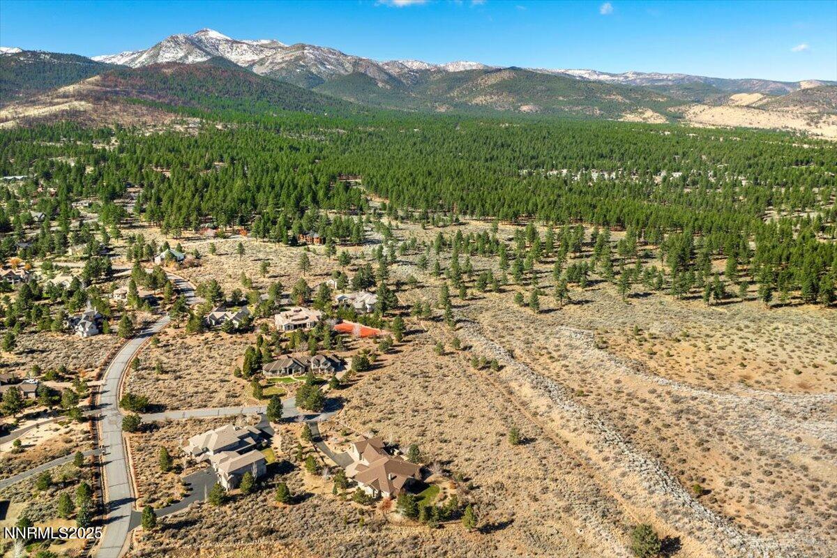 205 Paddington Court Reno, NV 89511 - Photo 4 of 17 a view of a lake with mountains in the background
