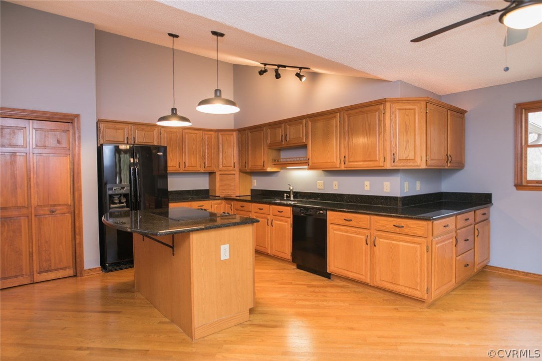 4002 Fraley Court Mechanicsville, VA 23111 - Photo 11 of 49 a kitchen with stainless steel appliances granite countertop a refrigerator a sink and a stove