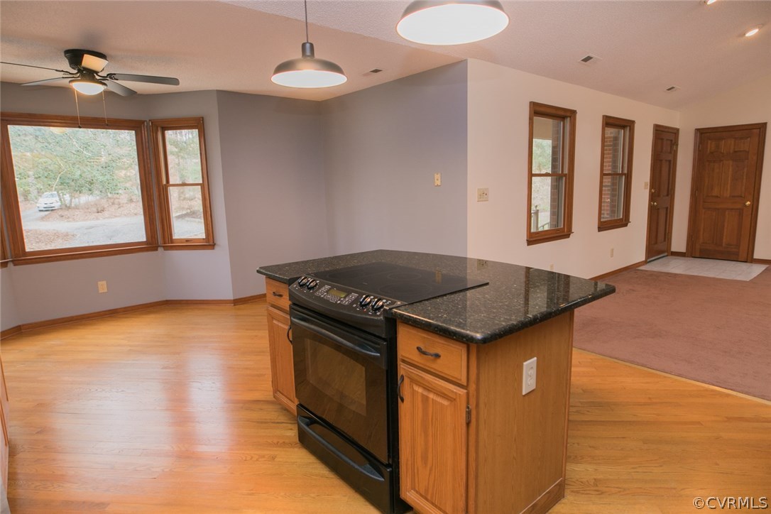 4002 Fraley Court Mechanicsville, VA 23111 - Photo 14 of 49 a kitchen with granite countertop a stove and a sink