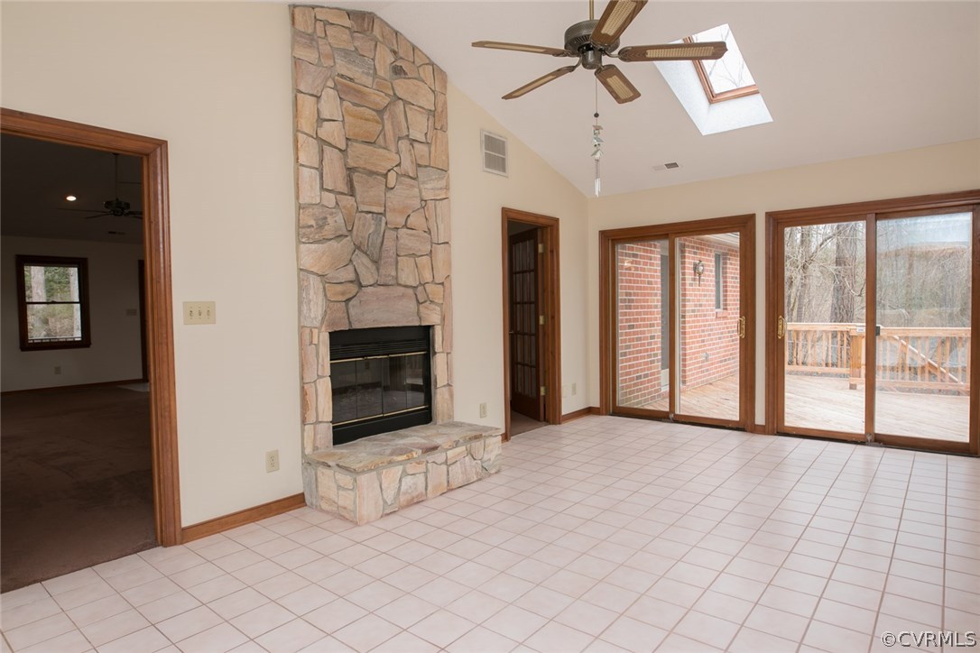 4002 Fraley Court Mechanicsville, VA 23111 - Photo 17 of 49 a view of an empty room with a fireplace and a window