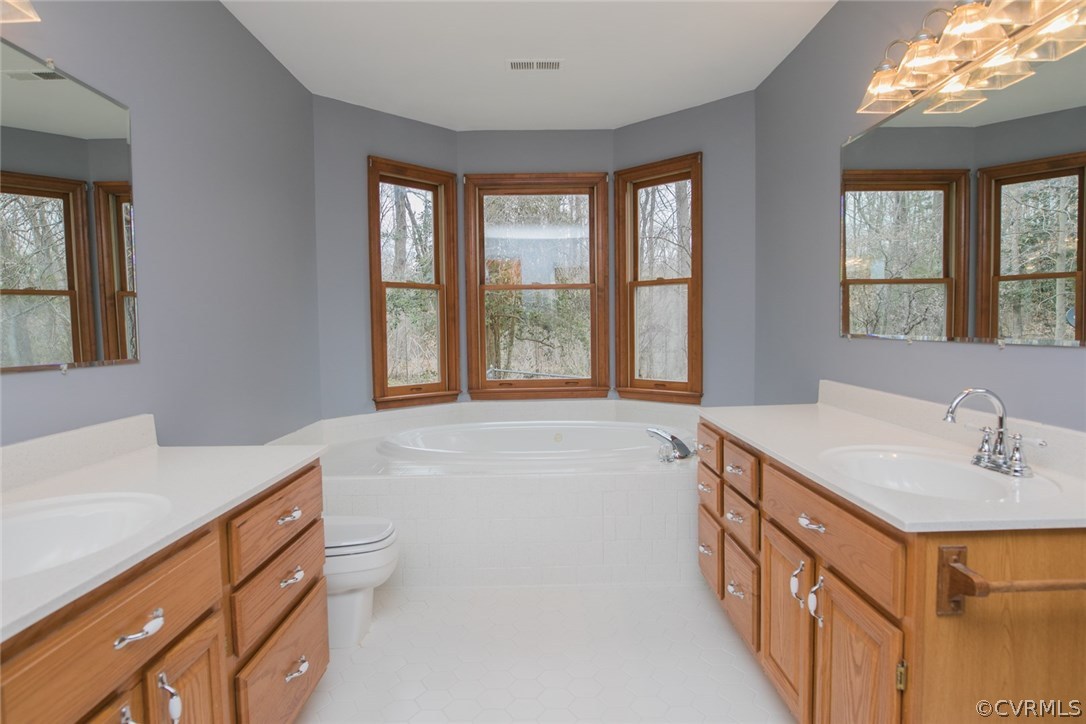 4002 Fraley Court Mechanicsville, VA 23111 - Photo 21 of 49 a bathroom with a sink and a bathtub