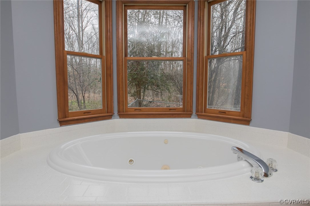 4002 Fraley Court Mechanicsville, VA 23111 - Photo 22 of 49 a white bath tub sitting next to a window