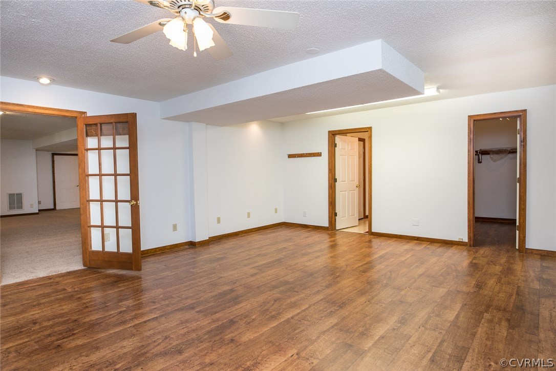 4002 Fraley Court Mechanicsville, VA 23111 - Photo 33 of 49 a view of an empty room with wooden floor and a window