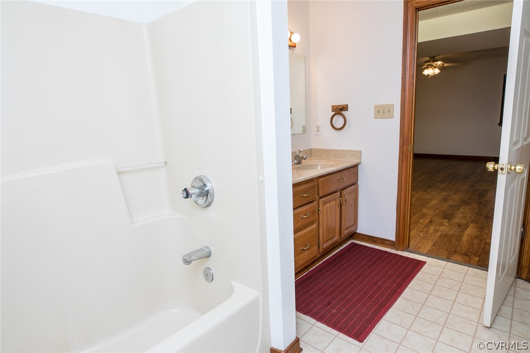 4002 Fraley Court Mechanicsville, VA 23111 - Photo 36 of 49 a bathroom with a tub sink and shower