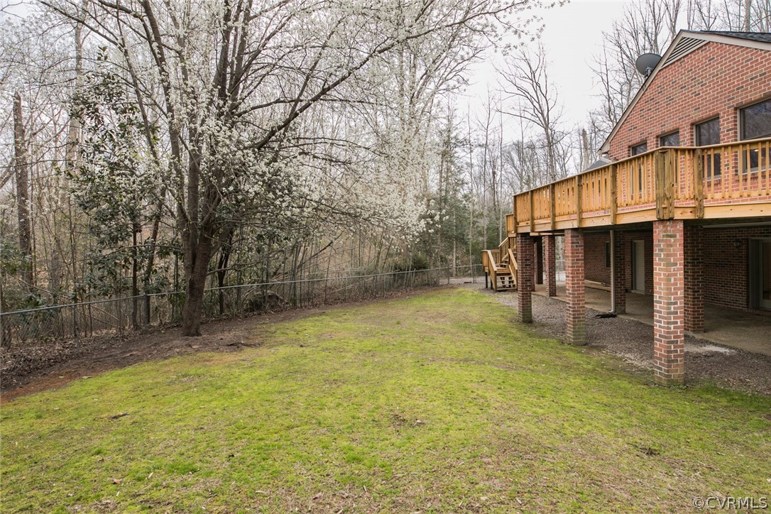 4002 Fraley Court Mechanicsville, VA 23111 - Photo 45 of 49 a view of a house with a backyard and a tree