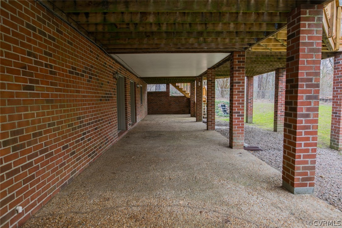4002 Fraley Court Mechanicsville, VA 23111 - Photo 46 of 49 a view of a porch with a table and chairs