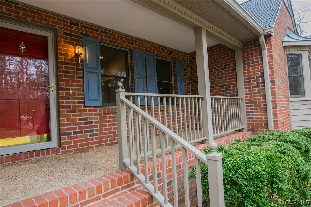 4002 Fraley Court Mechanicsville, VA 23111 - Photo 5 of 49 a view of a porch with a floor to ceiling window and wooden fence