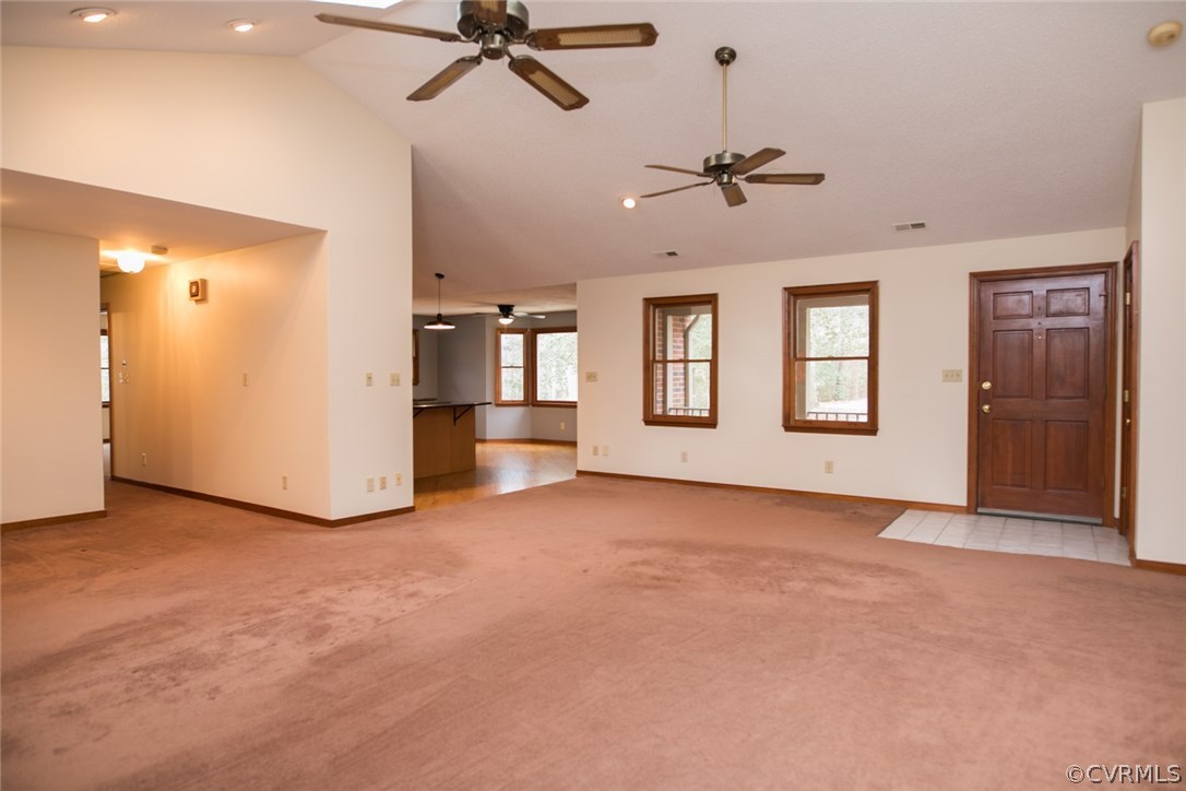 4002 Fraley Court Mechanicsville, VA 23111 - Photo 7 of 49 an empty room with chandelier fan and windows