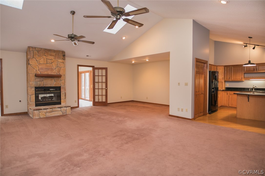 4002 Fraley Court Mechanicsville, VA 23111 - Photo 9 of 49 an empty room with windows and a fireplace