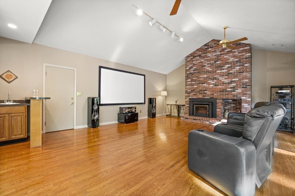 209 East Emerson Road Lexington, MA 02420 - Photo 8 of 37 a living room with furniture and a fireplace