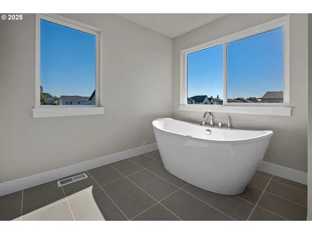 a view of a bathtub in a bathroom